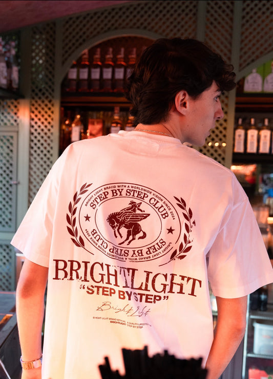 WHITE “STEP BY STEP” TEE